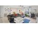 Bright living room features modern furnishings, a large window, and neutral color palette at 3721 Conway Ave, Charlotte, NC 28209