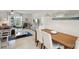 Open-concept living space featuring modern decor, dining area, and ample natural light at 3721 Conway Ave, Charlotte, NC 28209