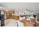 Open-concept living space with kitchen, dining area, and living room for seamless entertaining at 3721 Conway Ave, Charlotte, NC 28209