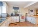 Practical kitchen with ample countertop space, essential appliances, and wood floors at 4059 10Th Avenue Sw Dr, Hickory, NC 28602