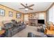 Inviting living room featuring a fireplace, plush seating, and neutral carpet at 4059 10Th Avenue Sw Dr, Hickory, NC 28602