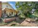 Covered porch featuring outdoor seating and a grill, perfect for enjoying the backyard at 4059 10Th Avenue Sw Dr, Hickory, NC 28602