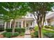 Attractive home exterior with manicured landscaping and a cozy front porch setting at 424 River Park Rd, Belmont, NC 28012