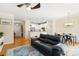 Open-concept living area with hardwood floors and seamless flow to the kitchen and dining at 424 River Park Rd, Belmont, NC 28012
