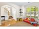 Inviting living room featuring hardwood floors, natural light, and comfortable seating at 424 River Park Rd, Belmont, NC 28012