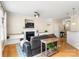 Spacious living room with fireplace, hardwood floors, and open layout to dining area at 424 River Park Rd, Belmont, NC 28012