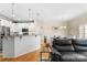 Inviting living area with a modern kitchen, dining space, and comfortable seating, great for entertaining at 424 River Park Rd, Belmont, NC 28012