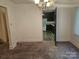 Dining room with a view into the kitchen at 4520 Bradbury Dr, Charlotte, NC 28209