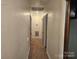 Hallway with three doors at 4520 Bradbury Dr, Charlotte, NC 28209