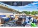 Inviting deck features a cozy seating area with plush cushions and a stylish outdoor rug at 454 N Eastway Dr, Troutman, NC 28166