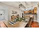 Charming dining area with hardwood floors and a view of the kitchen at 454 N Eastway Dr, Troutman, NC 28166