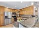 Beautiful kitchen with stainless steel appliances, granite counters, and wood cabinets at 454 N Eastway Dr, Troutman, NC 28166