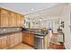 Cozy kitchen with wooden cabinets, stainless steel appliances, and granite countertops at 454 N Eastway Dr, Troutman, NC 28166