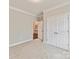 Bedroom features carpeted floors, a closet, and an ensuite entrance at 505 Belle Grove Dr, Lake Wylie, SC 29710