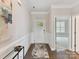 Inviting entryway featuring a classic white door and beautiful hardwood flooring with molding at 505 Belle Grove Dr, Lake Wylie, SC 29710