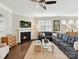 Cozy living room with fireplace, creating a warm and inviting atmosphere for relaxation at 505 Belle Grove Dr, Lake Wylie, SC 29710