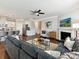 Inviting living room with a cozy fireplace and seamless access to the modern kitchen area at 505 Belle Grove Dr, Lake Wylie, SC 29710