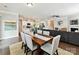 Open concept living area featuring an island with barstool seating and stainless steel appliances at 505 Belle Grove Dr, Lake Wylie, SC 29710
