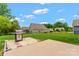 Backyard featuring a modern stainless steel grill, perfect for outdoor cooking and entertaining guests at 5079 Skyfest Dr, Charlotte, NC 28215