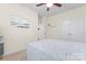 Bright bedroom with a painting, a ceiling fan, and a double door closet for ample storage at 5079 Skyfest Dr, Charlotte, NC 28215