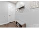 Welcoming hallway with a bench, decor, and ample lighting, offering a cozy and inviting entrance at 5079 Skyfest Dr, Charlotte, NC 28215