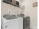 Functional laundry room equipped with a modern washer and dryer for convenient laundry care at 5079 Skyfest Dr, Charlotte, NC 28215
