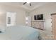 Large main bedroom with neutral paint, carpet flooring, walk-in closet, and ensuite bathroom at 5079 Skyfest Dr, Charlotte, NC 28215