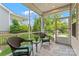 Inviting screened patio with comfortable seating, perfect for enjoying the outdoors while staying protected at 5079 Skyfest Dr, Charlotte, NC 28215