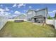 Spacious backyard with an above-ground pool, gazebo, patio, grill, and a privacy fence at 5125 Thomasville Dr, Belmont, NC 28012
