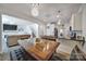 Open-concept dining area flows seamlessly into the living room and kitchen with lots of seating at 5125 Thomasville Dr, Belmont, NC 28012