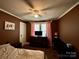 Bedroom featuring a ceiling fan and hardwood floors at 522 W Congress St, Lincolnton, NC 28092