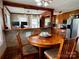 Charming dining area adjacent to the kitchen, featuring a round table with seating for four at 522 W Congress St, Lincolnton, NC 28092