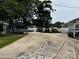 Long driveway leading to carport, featuring boat, and recreational vehicles at 522 W Congress St, Lincolnton, NC 28092