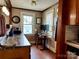 Functional kitchen with a workspace by the window, offering natural light and hardwood floors at 522 W Congress St, Lincolnton, NC 28092
