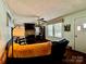 Cozy living room with a fireplace, hardwood floors, and a comfortable seating area at 522 W Congress St, Lincolnton, NC 28092