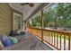 Relaxing back porch with outdoor seating, overlooking a pool, pergola, and lush landscaping at 5317 Black Oak Ln # 11, Waxhaw, NC 28173