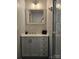 Bathroom vanity with marble backsplash and a white vessel sink at 5317 Black Oak Ln # 11, Waxhaw, NC 28173