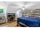 Unique bedroom with lots of shelving space and a comfortable bed at 5317 Black Oak Ln # 11, Waxhaw, NC 28173