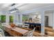 Stylish dining area with an open view into the kitchen, featuring a large wooden table at 5317 Black Oak Ln # 11, Waxhaw, NC 28173