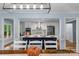 Bright, open kitchen featuring white cabinets, stainless steel appliances, and a large island with a blue base at 5317 Black Oak Ln # 11, Waxhaw, NC 28173