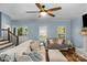 Cozy living room featuring hardwood floors, ample seating, and natural light from large windows at 5317 Black Oak Ln # 11, Waxhaw, NC 28173