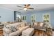 Cozy living room with hardwood floors, light blue walls and lots of seating at 5317 Black Oak Ln # 11, Waxhaw, NC 28173