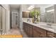 Elegant bathroom with double vanity, granite countertops, and glass-enclosed shower at 5655 Arnold Way, Mount Pleasant, NC 28025