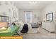 A stylish bedroom with a patterned wall, a desk, and ample natural light at 5655 Arnold Way, Mount Pleasant, NC 28025