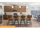 Spacious kitchen with island seating, stainless appliances, and stylish pendant lighting at 5655 Arnold Way, Mount Pleasant, NC 28025