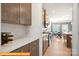 Modern kitchen with stainless appliances, granite countertops, and ample cabinet space at 5655 Arnold Way, Mount Pleasant, NC 28025