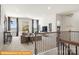 Upstairs living room with large windows, comfortable seating, and stylish furnishings at 5655 Arnold Way, Mount Pleasant, NC 28025