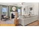 Cozy living room featuring a fireplace, ample seating, and natural light at 5655 Arnold Way, Mount Pleasant, NC 28025