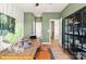 Bright home office with wood desk, stylish decor, and easy access to other areas of the house at 5655 Arnold Way, Mount Pleasant, NC 28025
