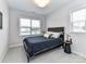 Bedroom featuring bed, window, and side table creating a cozy, comfortable, and inviting space at 5811 Mantle Way, Kannapolis, NC 28081